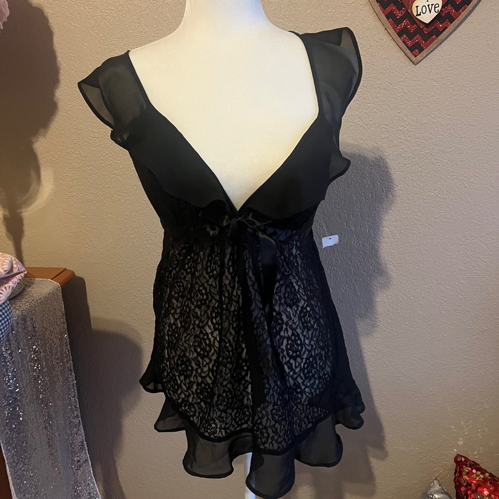 Movie star intimates black babydoll